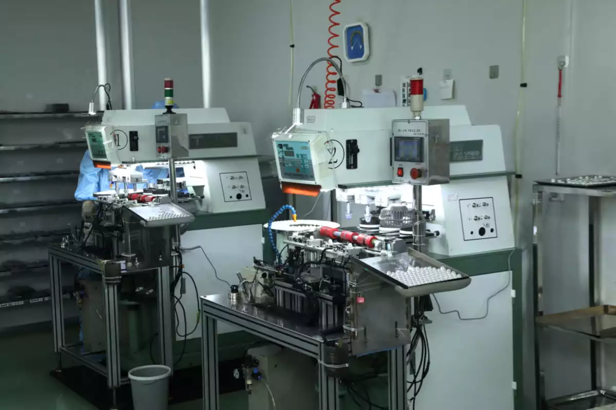 Automated optical inspection and lens centering system